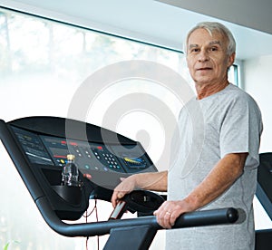 Senior man on a treadmill