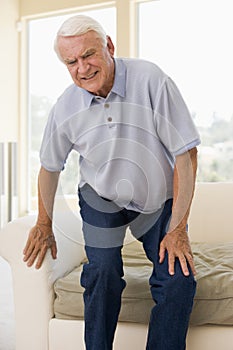 Senior Man Trying To Sit Down