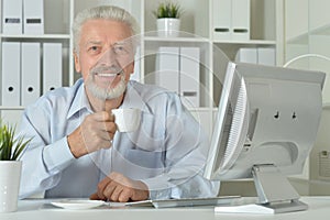 Senior man using computer