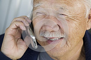 Senior Man Using Mobile Phone