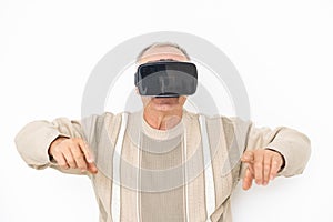 Senior man using VR Goggles
