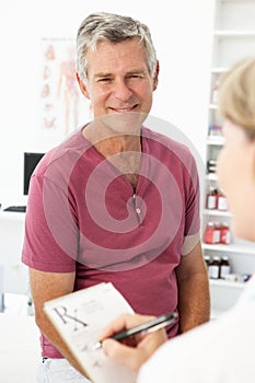 Senior man visiting doctor