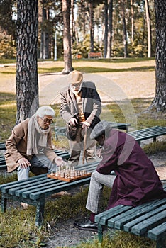 Senior man with walking cane standing