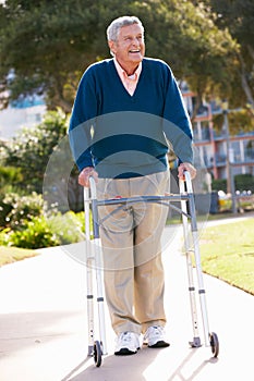 Senior Man With Walking Frame