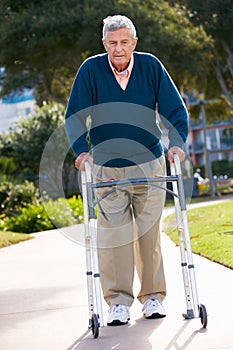 Senior Man With Walking Frame