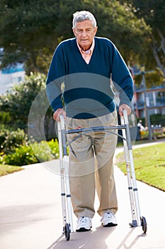 Senior Man With Walking Frame