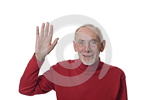 Senior man waving happily