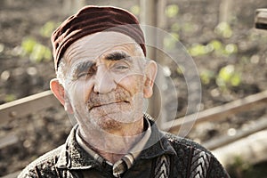 Senior man wearing cap