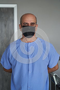 Senior man wearing face mask during corona virus and flu outbreak