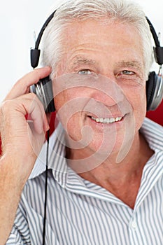 Senior man wearing headphones