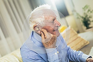 Senior man wearing hearing aid