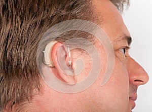 Senior man wearing hearing aid