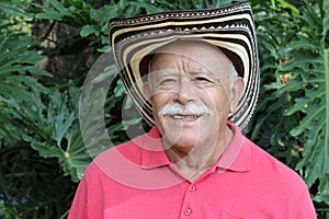 Senior man wearing traditional Colombian hat photo