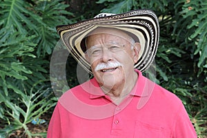 Senior man wearing traditional Colombian hat photo