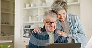 Senior man, woman and taxes with laptop, kiss and glasses for reading, thinking or check paperwork. Old people, couple