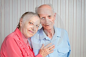 Senior Man, Woman with their Caregiver at Home.