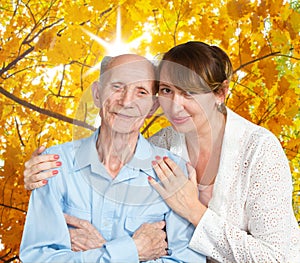 Senior Man, Woman with their Caregiver at Home.