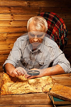 Senior man in wooden interior