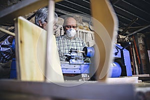 Senior man working in a carpentry