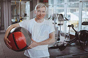 Senior man working out at the gym