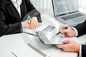 Senior manager HR reading a resume during a job interview employee young woman meeting Applicant and recruitment. Interview