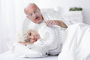 Senior marriage in bed