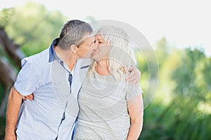 Senior marriage kissing fondly