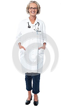 Senior medical professional posing