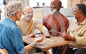 Senior men, friends and dominoes in board games on wooden table for activity, social bonding or gathering. Elderly group