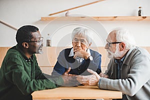 Senior men having conversation