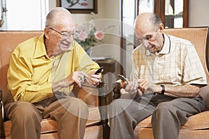 Senior men text messaging