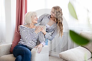 Senior mother surprisingly looking at her daughter