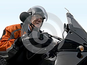 Senior on a motorbike