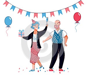 Senior old couple at birthday celebration with party hat, balloons, gift box