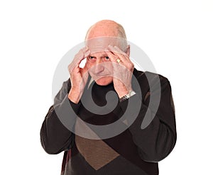 Senior older man holding head with stress headache