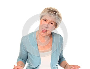 Senior older woman sticking out tongue