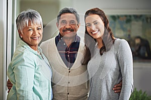 Senior parents, daughter and portrait of family in living room with embrace for connection, love and bonding together