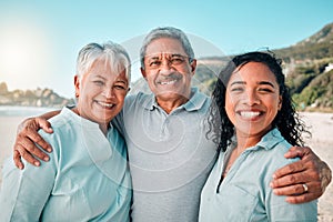 Senior parents, daughter and smile on beach, hug and happiness in summer vacation together outdoors. Portrait of happy