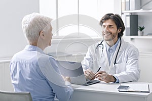 Senior patient at appointment of geriatrician doctor photo