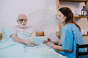 Senior patient and caregiver