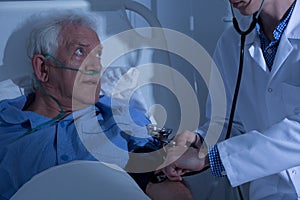 Senior patient examined by doctor
