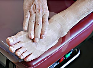 Senior patient foot on bench photo