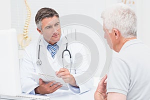 Senior patient sharing problems with doctor