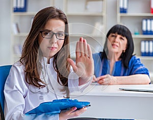 Senior patient visiting doctor for regular check-up