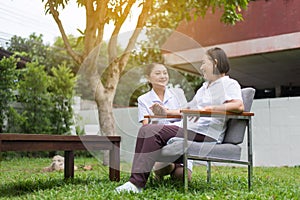 Senior patient woman hands holding with caregiver,Nursing home care concept