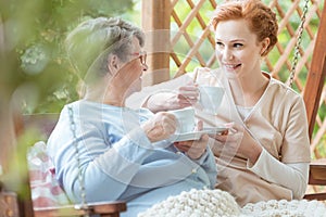 Pensioner drinking tea