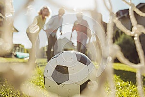 Senior people celebrating after scoring a goal while playing football