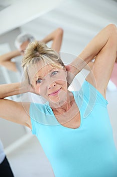 Senior people doing stretching excercises