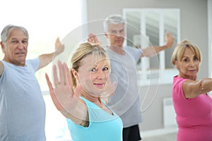 Senior people doing yoga excercises