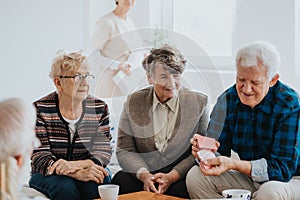 Senior people eating dinner